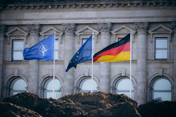 The flag of NATO, Europe and the Federal Republic of Germany photographed at the Reichstag building in Berlin, 04/04/2024