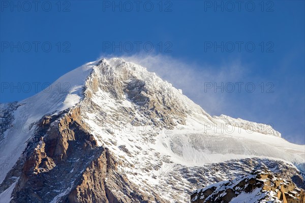 Gran Paradiso, Grand Paradis on a windy day in winter, mountain top in the Graian Alps between the Aosta Valley and Piedmont in Italy