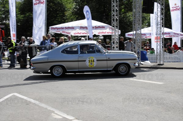 A silver-coloured classic car drives on a race track in front of spectators, SOLITUDE REVIVAL 2011, Stuttgart, Baden-Wuerttemberg, Germany, Europe
