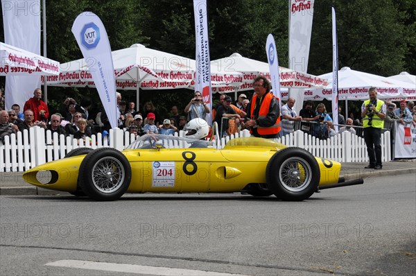 Yellow vintage racing car in action at a motorsport event, SOLITUDE REVIVAL 2011, Stuttgart, Baden-Wuerttemberg, Germany, Europe