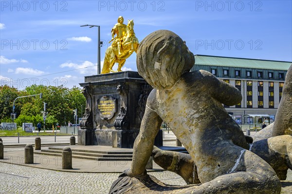 Eastern Nymph Fountain with a view of the Golden Horseman on Neustaedter Markt in Dresden, Saxony, Germany, Europe