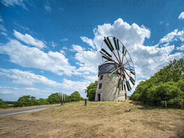 Old windmill under a clear blue sky with white clouds, tower windmill, Eckartsberga, Saxony-Anhalt, Germany, Europe