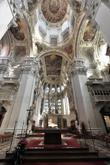 St Stephen's Cathedral, Passau, central perspective of a baroque church interior with high altar and light-flooded columns, Passau, Bavaria, Germany, Europe