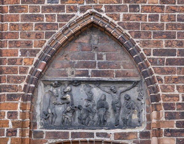 Relief with crucified Christ at the parish church of St Laurentius, Havelberg, Saxony-Anhalt, Germany, Europe