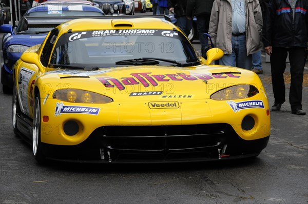 A yellow racing car with advertising stickers and the Michelin logo, SOLITUDE REVIVAL 2011, Stuttgart, Baden-Wuerttemberg, Germany, Europe
