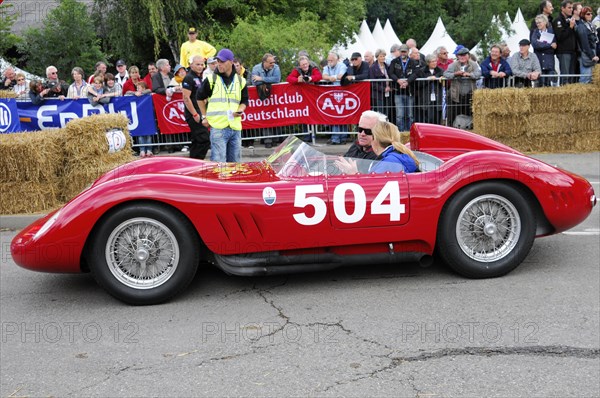 Driver in a red classic racing car with starting number 504 in front of a crowd, SOLITUDE REVIVAL 2011, Stuttgart, Baden-Wuerttemberg, Germany, Europe