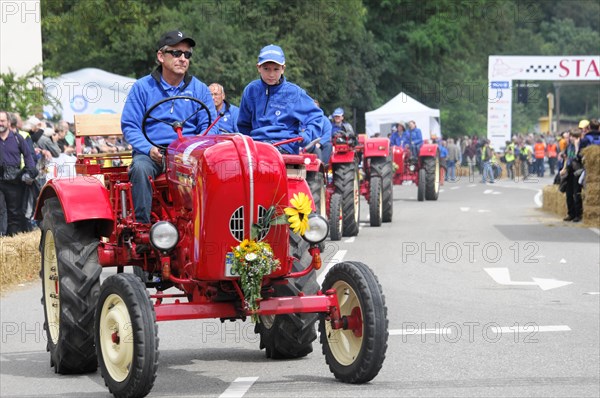 Porsche diesel tractors, drivers in red vintage tractors take part in a rally, SOLITUDE REVIVAL 2011, Stuttgart, Baden-Wuerttemberg, Germany, Europe