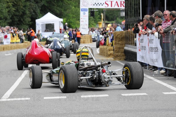 Colourful formula car at the start of a race with spectators in the background, SOLITUDE REVIVAL 2011, Stuttgart, Baden-Wuerttemberg, Germany, Europe