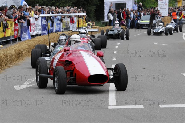 A red vintage formula racing car on a race track at a classic car event, SOLITUDE REVIVAL 2011, Stuttgart, Baden-Wuerttemberg, Germany, Europe