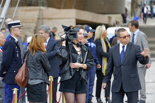 Marseille City Hall, A journalist films an event surrounded by passers-by and a police officer, Marseille, Departement Bouches-du-Rhone, Provence-Alpes-Cote d'Azur region, France, Europe