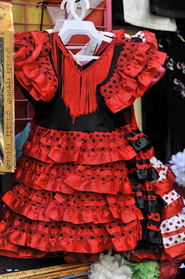 Granada, Colourful red flamenco dress with black dots and fringes, Granada, Andalusia, Spain, Europe
