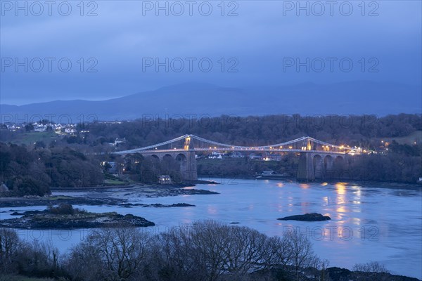 Menai Suspension Bridge in the evening, Menai Strait, LLanfair Pwllgwyngyll, Isle of Anglesey, Wales, United Kingdom, Europe