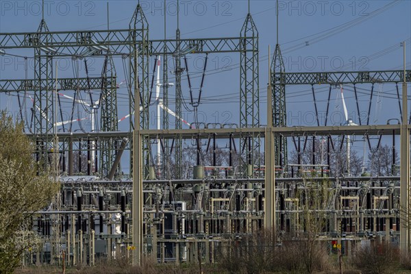 Stendal West substation with wind turbines in the background near Luederitz, Stendal, Saxony-Anhalt, Germany, Europe