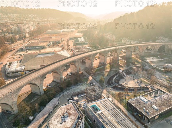 Aerial view of a town with bridge illuminated by sunlight, sunrise, Nagold, Black Forest, Germany, Europe