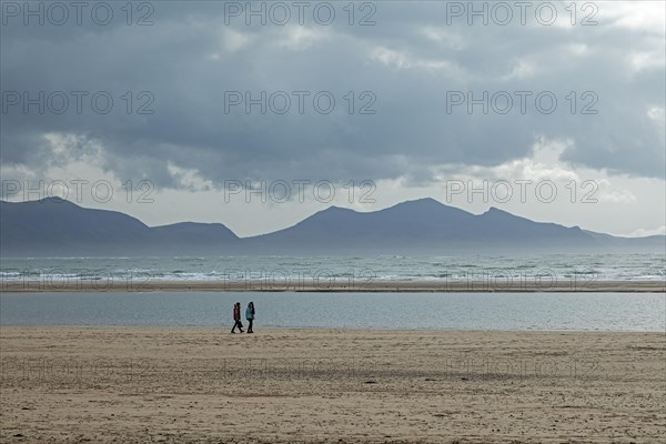 Beach, people, clouds, mountains, LLanddwyn Bay, Newborough, Isle of Anglesey, Wales, Great Britain