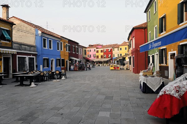 Colourful houses, Burano, Burano Island, Lively shopping street with market stalls and colourful facades on an island, Burano, Venice, Veneto, Italy, Europe