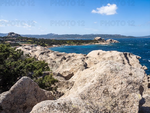 Typical granite rock formations in front of a bay, Baja Sardinia, Costa Smeralda, Sardinia, Italy, Europe