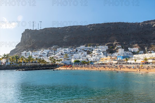 Seen from the beach of the touristic coastal town Mogan in the south of Gran Canaria in summer. Spain