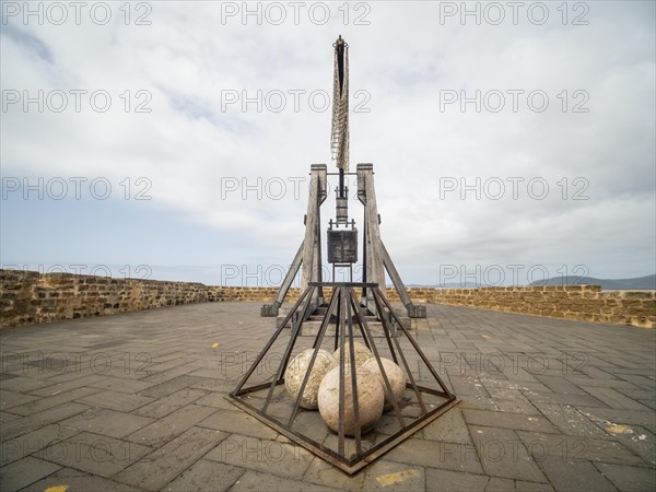 Old siege engine, fortress wall of Alghero, Sardinia, Italy, Europe