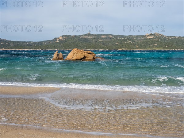 Rock formation in the sea, Spiaggia Capriccioli, Costa Smeralda, Sardinia, Italy, Europe