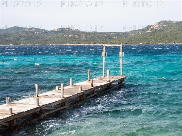 Jetty leading into the sea, Capriccioli beach, Costa Smeralda, Sardinia, Italy, Europe