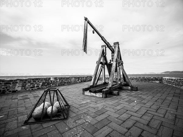 Old siege engine, fortress wall of Alghero, Sardinia, Italy, Europe