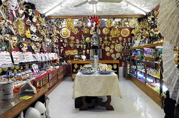 Burano, Burano Island, interior view of a shop full of traditional masks and decorated objects, Burano, Venice, Veneto, Italy, Europe