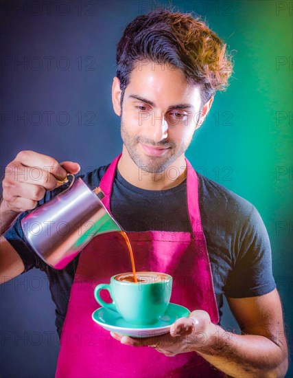 Man in a pink apron expertly pours coffee into a green cup with a look of satisfaction, Vertical aspect ratio, AI generated