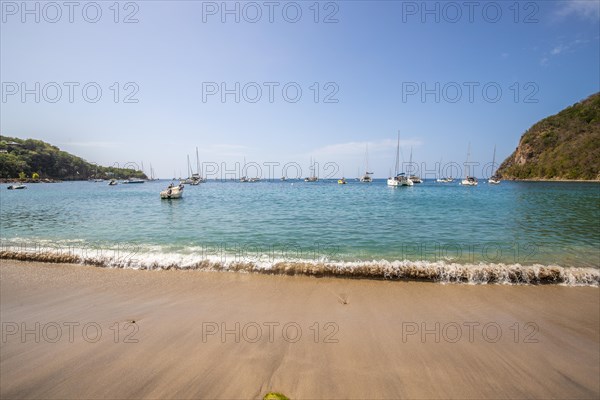 A beach in the Caribbean on the Atlantic coast in Deshaies, Guadeloupe, French Antilles, North America