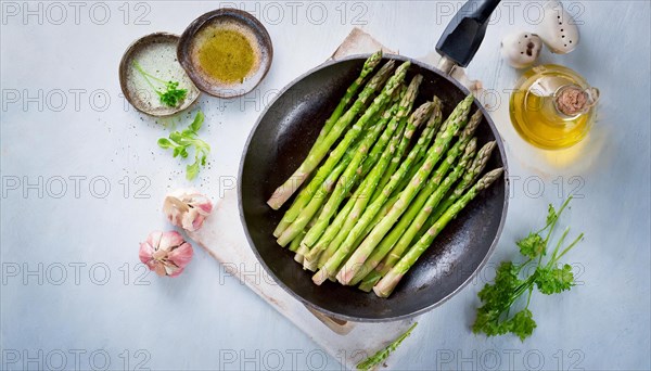 Simple still life with asparagus in a pan and simple ingredients on a light-coloured background, green asparagus, asparagus spears, KI generated, AI generated