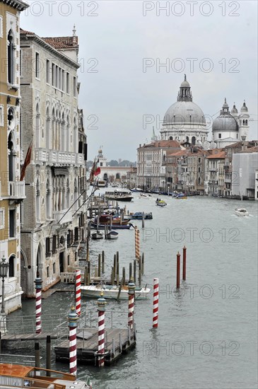 View of a wide canal in Venice with a church in the background, Venice, Veneto, Italy, Europe