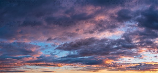 Dramatic storm clouds in the morning light, panorama, wallpaper, sky replacement