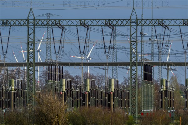 Stendal West substation with wind turbines in the background near Luederitz, Stendal, Saxony-Anhalt, Germany, Europe