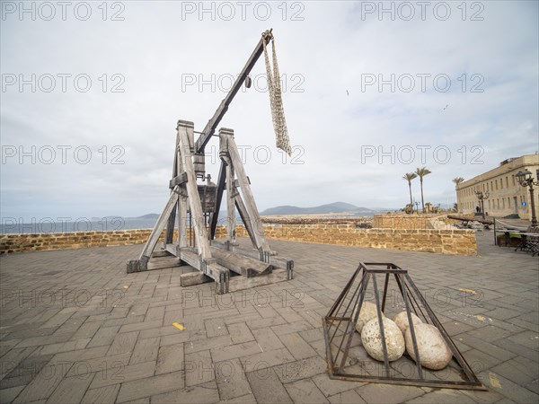 Old siege engine, fortress wall of Alghero, Sardinia, Italy, Europe