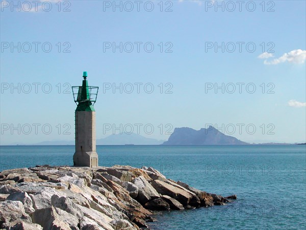 Lighthouse with View over Gibraltar and African Coast in Morocco in Mediterranean Sea in a Sunny Day in Sotogrande, Cadiz, Spain, Europe