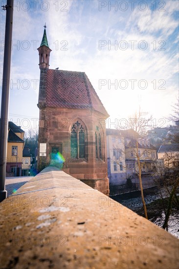 A historic church with sunlight falling on the old architecture, Calw, Black Forest, Germany, Europe