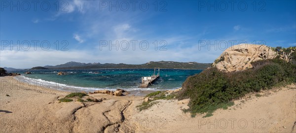 Rock formations, jetty leading into the sea, panoramic shot, Capriccioli beach, Costa Smeralda, Sardinia, Italy, Europe