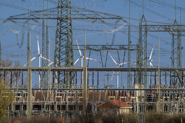 Stendal West substation with wind turbines in the background near Luederitz, Stendal, Saxony-Anhalt, Germany, Europe