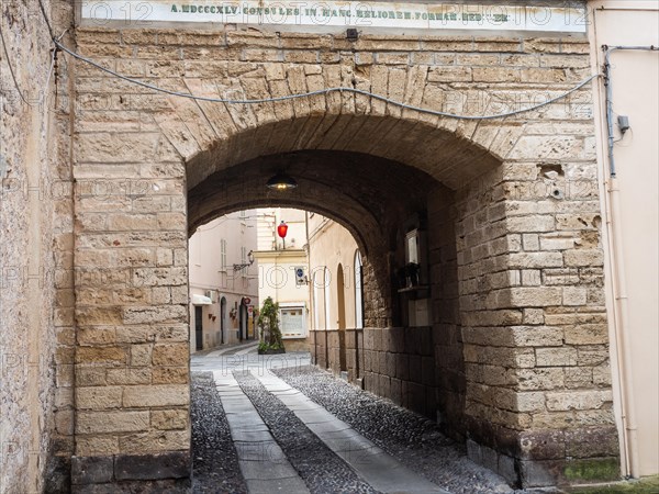 City gate in the old fortress wall, Alghero, Sardinia, Italy, Europe