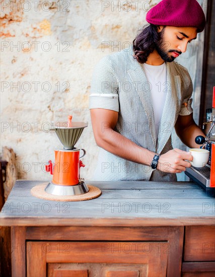 Fashionista man in a red hat prepares coffee with an espresso machine and a red coffee maker, Vertical aspect ratio, AI generated