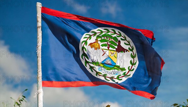 Flags, the national flag of Belize flutters in the wind