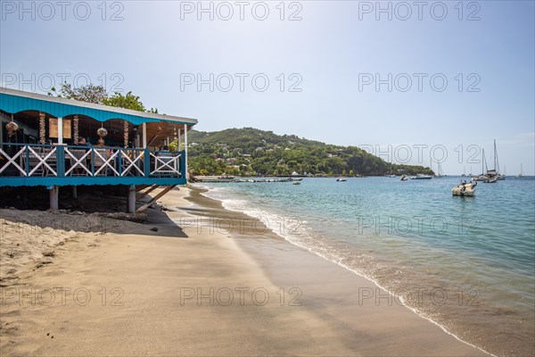 A beach in the Caribbean on the Atlantic coast in Deshaies, Guadeloupe, French Antilles, North America