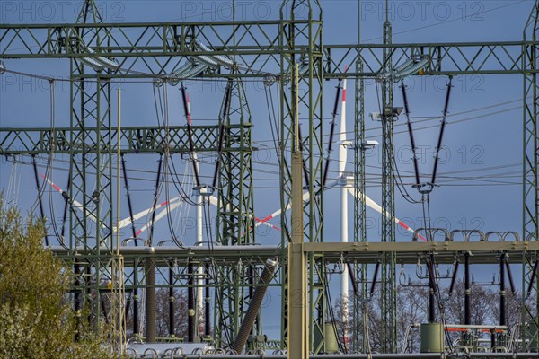 Stendal West substation with wind turbines in the background near Luederitz, Stendal, Saxony-Anhalt, Germany, Europe