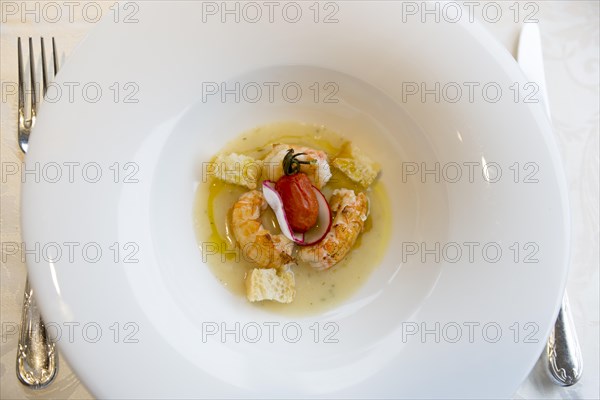 White plate with Seafood and Fork and Knife in Italy