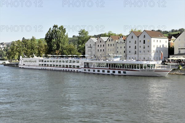 The river cruiser VIKING EUROPE, built in 2001, 114, 30 metres long near Passau, large river cruise ship at a landing stage on the outskirts of the city, Passau, Bavaria, Germany, Europe
