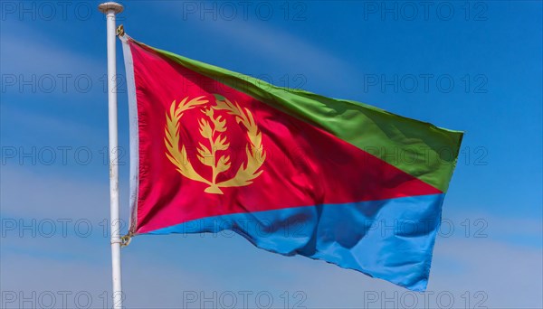 Flags, the national flag of Eritrea flutters in the wind