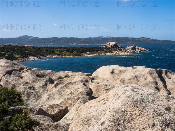 Typical granite rock formations in front of a bay, Baja Sardinia, Costa Smeralda, Sardinia, Italy, Europe