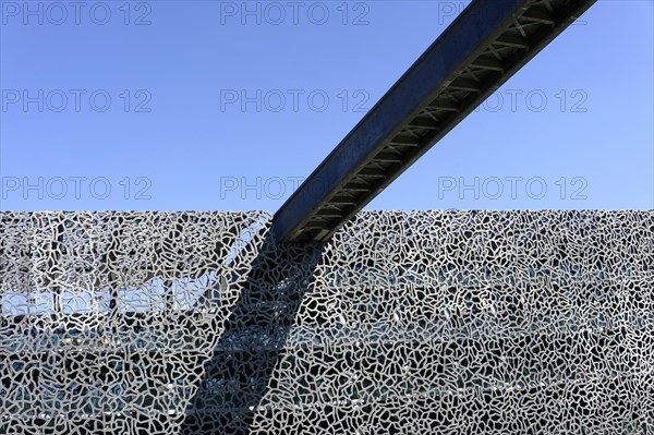 Modern metal structure of a building with an interesting pattern against a clear sky, Marseille, Departement Bouches-du-Rhone, Provence-Alpes-Cote d'Azur region, France, Europe