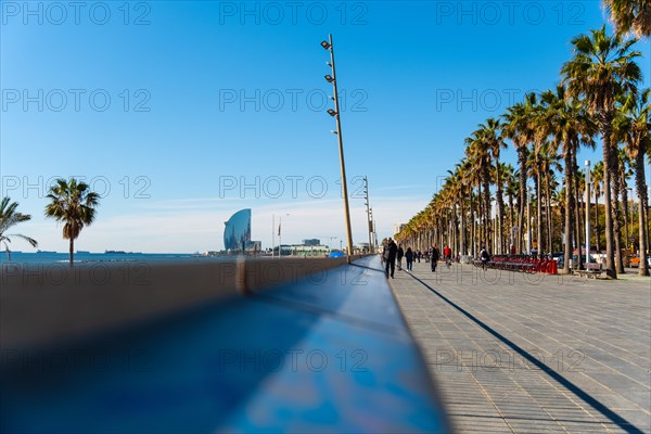 Promenade with joggers on the beach in Barcelona, Spain, Europe