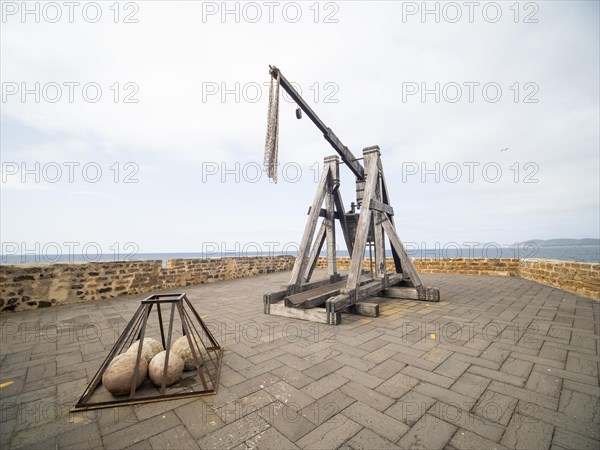 Old siege engine, fortress wall of Alghero, Sardinia, Italy, Europe